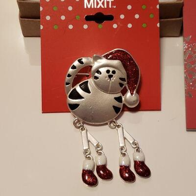 Lot 294: (3) Cat Holiday Brooches and Anklet