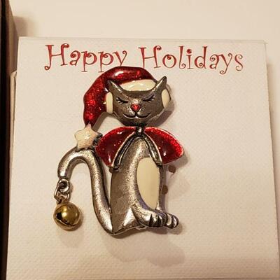 Lot 294: (3) Cat Holiday Brooches and Anklet