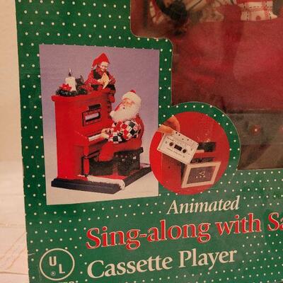Lot 302: Animated Santa Claus Piano Player Tape 