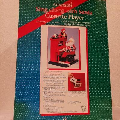 Lot 302: Animated Santa Claus Piano Player Tape 