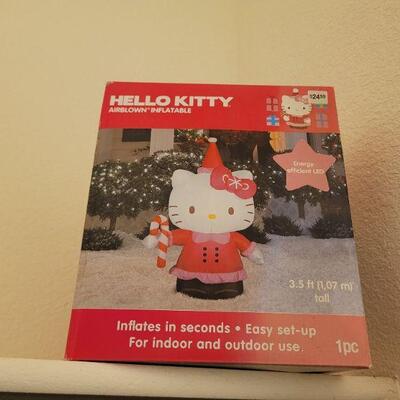 Lot 313: NEW Hello Kitty INFLATABLE Christmas Yard Deco