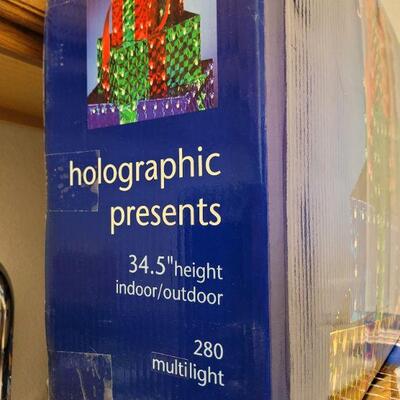 Lot 320: Outdoor Holographic Presents Yard Deco