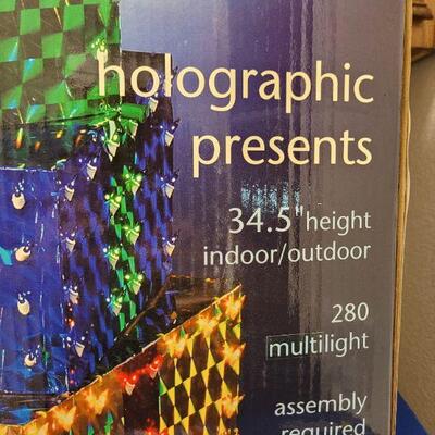 Lot 320: Outdoor Holographic Presents Yard Deco