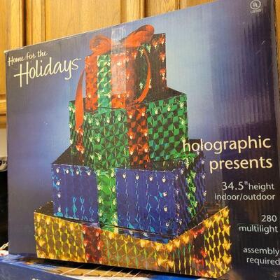 Lot 320: Outdoor Holographic Presents Yard Deco