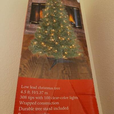 Lot 321: 4.5 Tall Pre Lit Christmas Tree NEW