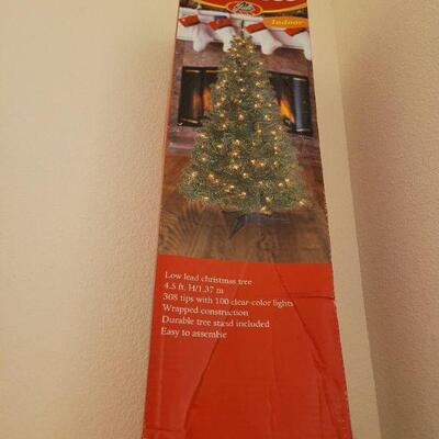 Lot 321: 4.5 Tall Pre Lit Christmas Tree NEW