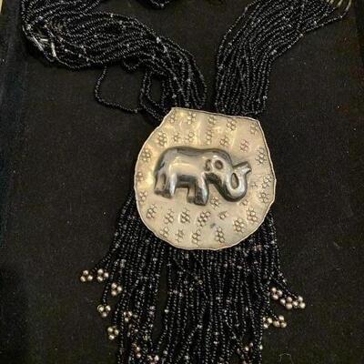 Large Elephant pendant on multi layered chains 