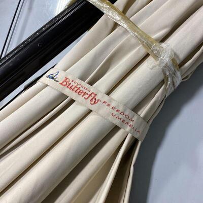 .212. Southern Patio Articulating Umbrella 