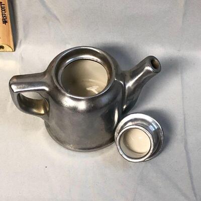 Small Silver Colored Ceramic Teapot