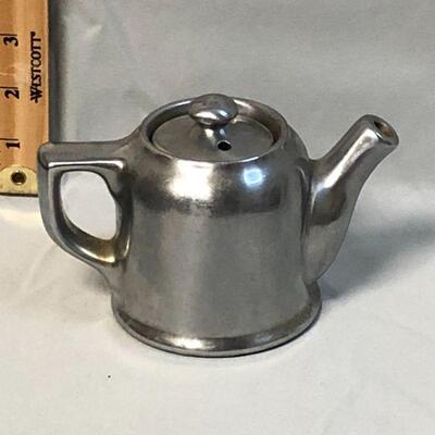 Small Silver Colored Ceramic Teapot