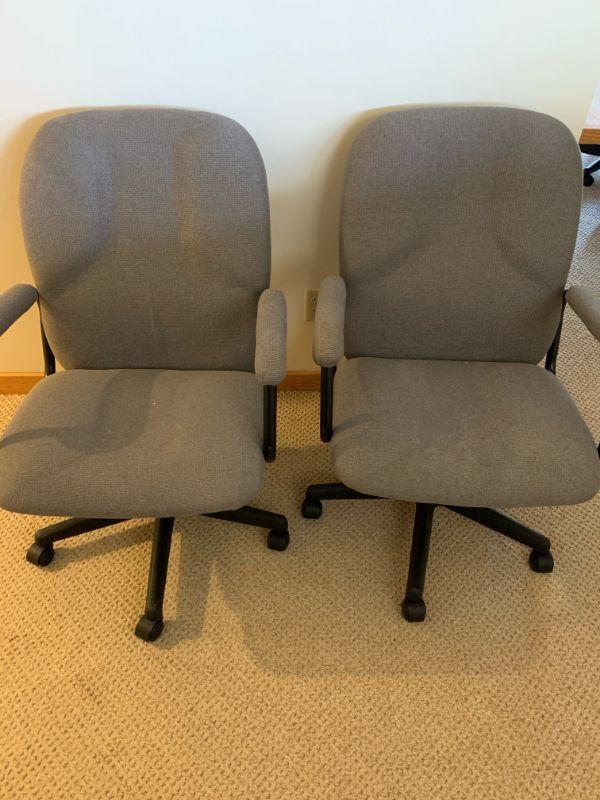 2 office chairs on rollers