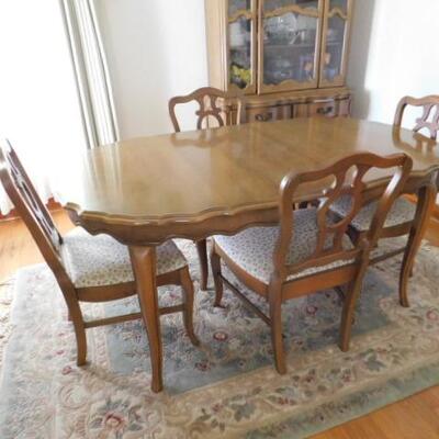 Vintage Solid Wood Dining Table with Four Matching Chairs