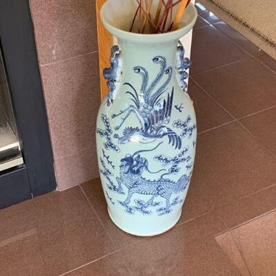 Matching pair of Asian motif floor vases 