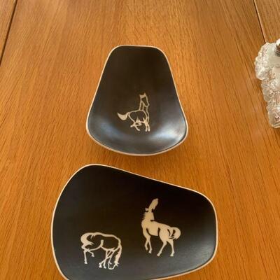 two black and white equine etruscan spoon rests