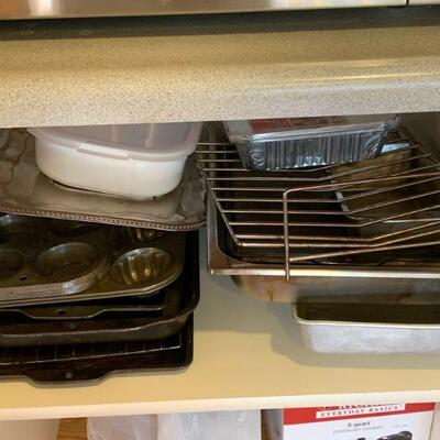 selection of kitchen pans, cookie trays, muffin pans