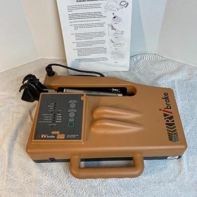 Lot# 132 s RVibrake portable unit 12 volt with remote box and instructions 