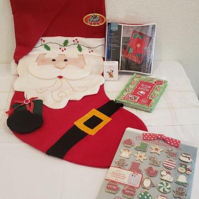 Lot 341: New - Large Stocking, Magnet Set, Pop Up Christmas Picture Frame/Book & Outdoor Flag