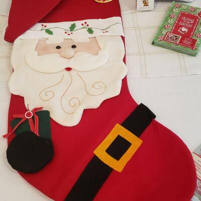 Lot 341: New - Large Stocking, Magnet Set, Pop Up Christmas Picture Frame/Book & Outdoor Flag