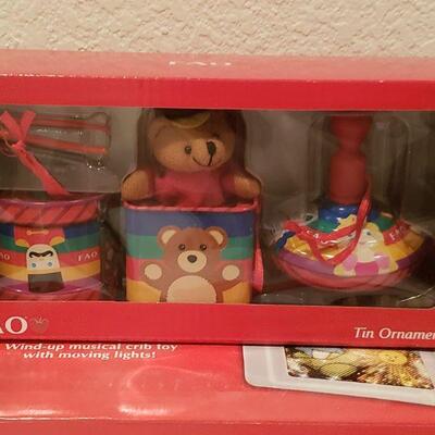Lot 365: NEW/Old Stock Playskool Baby Musical Dream Screen, FAO Toy Ornaments and "Prince" Embossed Picture Frame