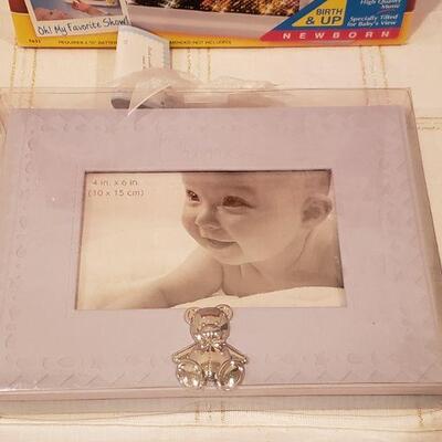 Lot 365: NEW/Old Stock Playskool Baby Musical Dream Screen, FAO Toy Ornaments and "Prince" Embossed Picture Frame