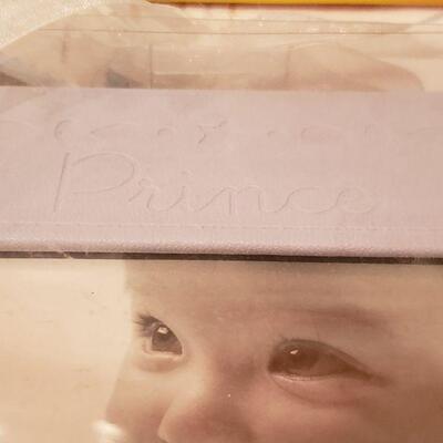 Lot 365: NEW/Old Stock Playskool Baby Musical Dream Screen, FAO Toy Ornaments and "Prince" Embossed Picture Frame