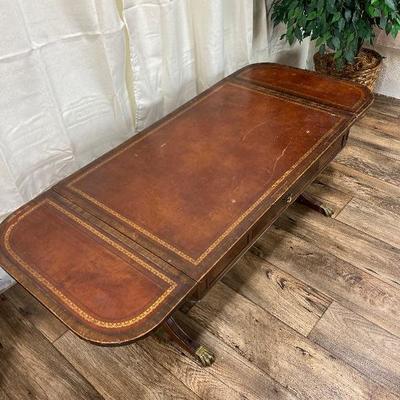 Lot# 189 Vintage Leather Top Drop Leaf Coffee Table