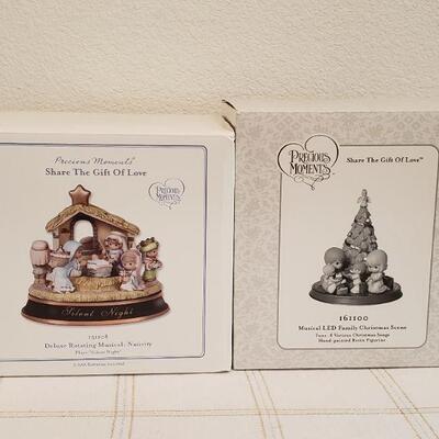 Lot 379: New Precious Moments Nativity and Family Christmas Scene
