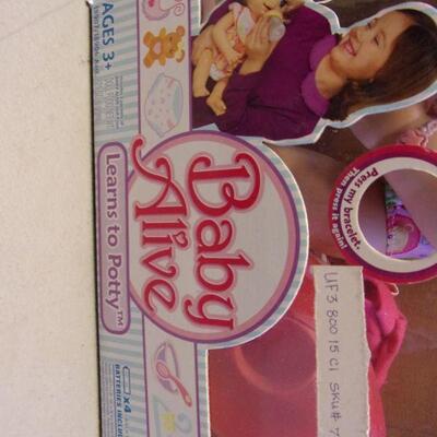 Lot 101 - Baby Alive - Learn To Potty