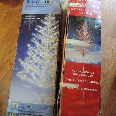 TWO LIGHT UP TREES