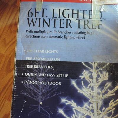 TWO LIGHT UP TREES