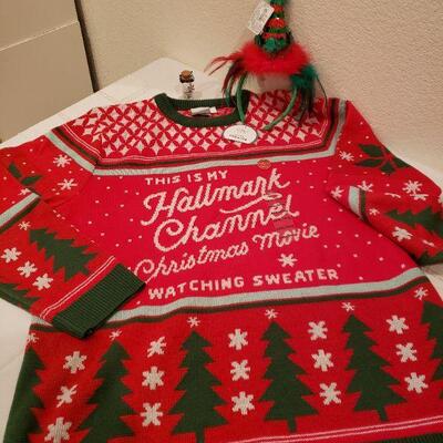 Lot 438: NEW Hallmark Sweater, Charm Bracelet & Christmas Headband