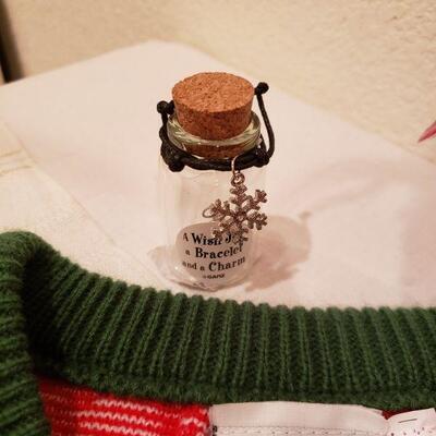 Lot 438: NEW Hallmark Sweater, Charm Bracelet & Christmas Headband