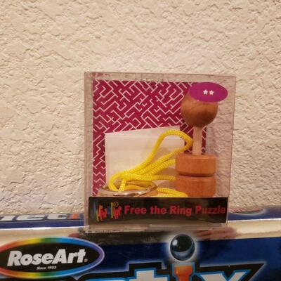 Lot 457:  NEW 2 Games and a Plushie Reindeer 