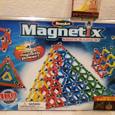 Lot 457:  NEW 2 Games and a Plushie Reindeer 