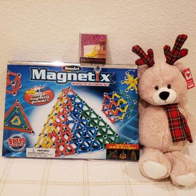 Lot 457:  NEW 2 Games and a Plushie Reindeer 