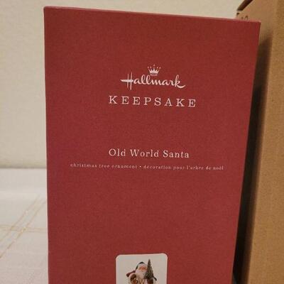 Lot 523: Hallmark Porcelain Santa Figure + Rudolph Figure 