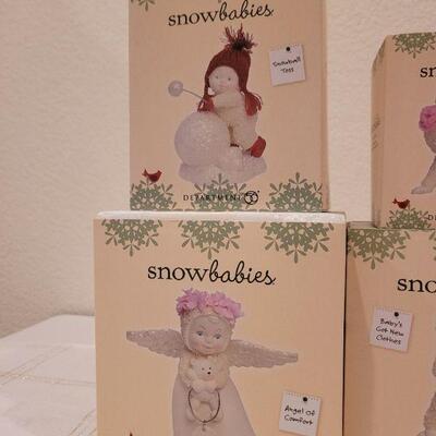 Lot 529: Assorted Dept. 56 Snowbabies Christmas Figures