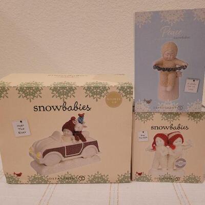Lot 530: Assorted Dept 56 Snowbabies Christmas Figures
