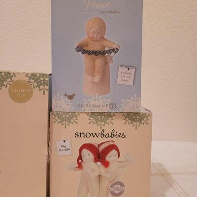 Lot 530: Assorted Dept 56 Snowbabies Christmas Figures