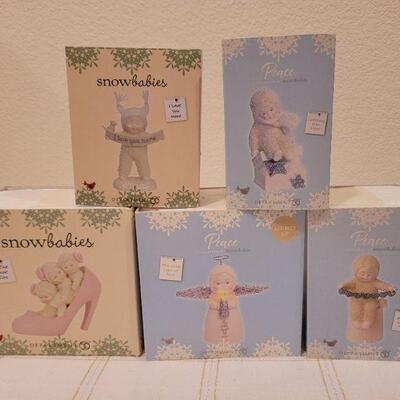 Lot 531: Assorted Dept 56 Snowbabies Figures