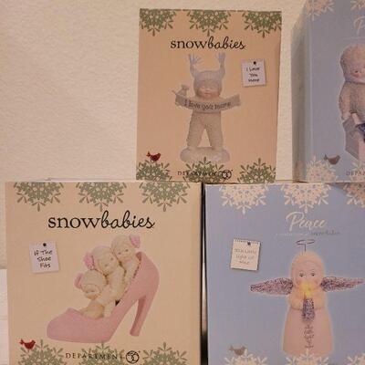 Lot 531: Assorted Dept 56 Snowbabies Figures