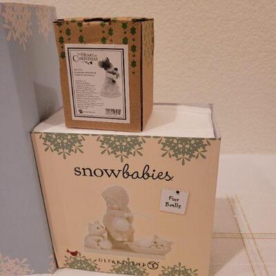 Lot 534: Assorted Dept 56 Snowbabies Christmas Figures 
