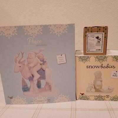Lot 534: Assorted Dept 56 Snowbabies Christmas Figures 