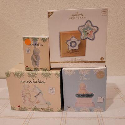 Lot 535: Assorted Dept 56 Snowbabies Christmas Figures 