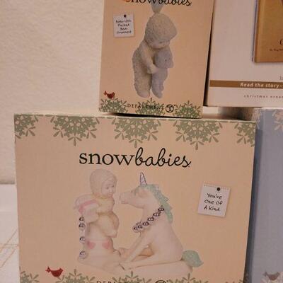 Lot 535: Assorted Dept 56 Snowbabies Christmas Figures 