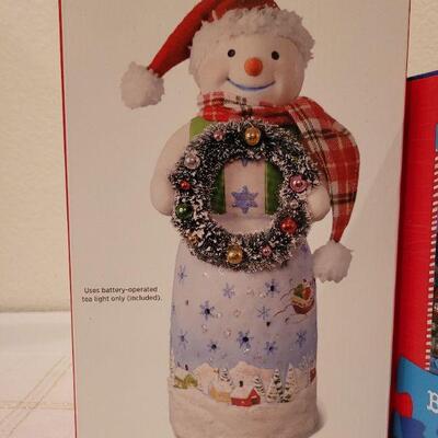 Lot 541: Hallmark Christmas Figure + New Puzzle