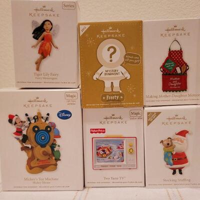 Lot 555: Assorted Hallmark Christmas Ornaments 