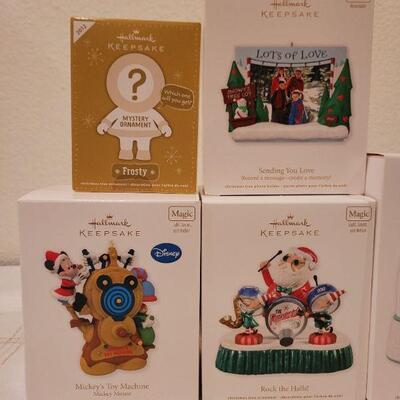 Lot 557: Assorted Hallmark Christmas Ornaments 