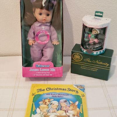 Lot 606: NEW Jesus Loves Me Doll, Precious Moments Nativity and The Christmas Story BookGift Lot