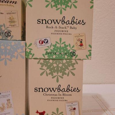 Lot 625: Assorted Dept 56 Snowbabies Christmas Figures 